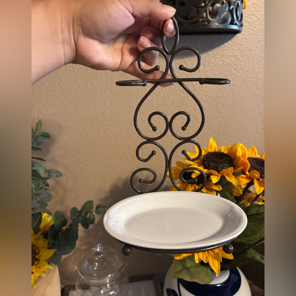 Princess house 
Elegant Black Metal Scroll Plate Holder